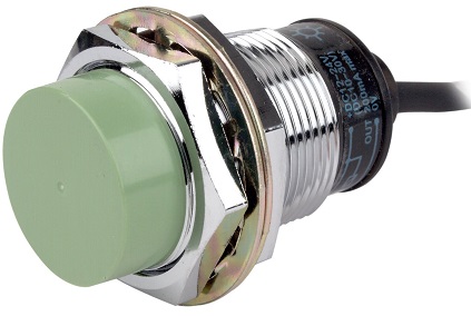 An inductive proximity sensor available for purchase on Amazon. The sensor has a chrome finish with a green face.